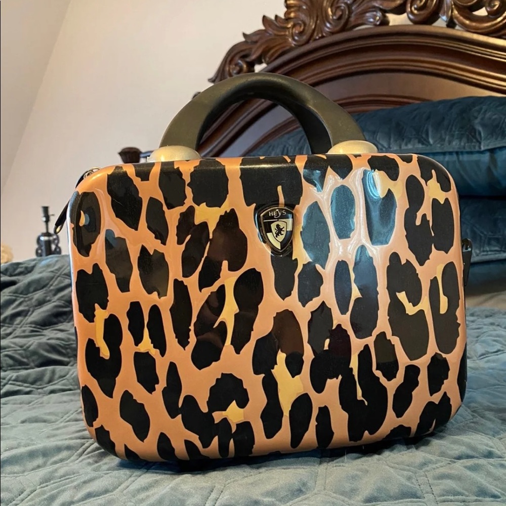 Heys mini leopard luggage